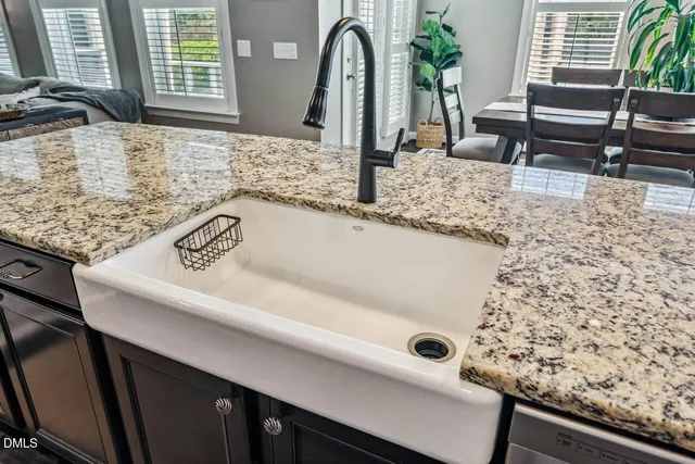 a bedroom with a bed and a tv