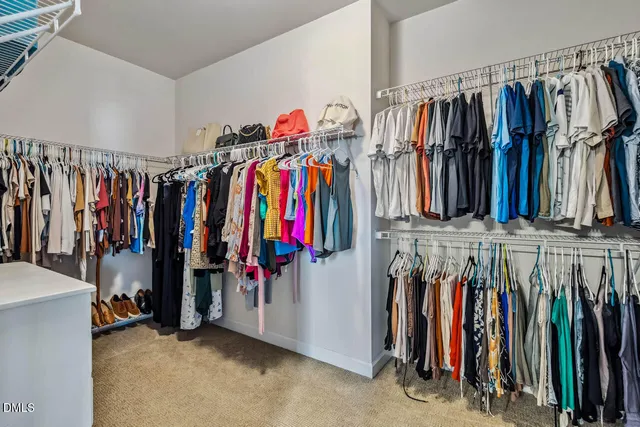 a view of a house with backyard sitting area and swimming pool