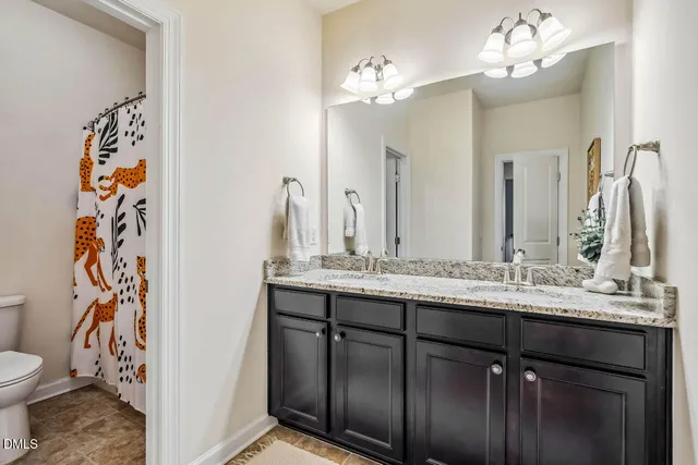 a view of a swimming pool with an outdoor seating