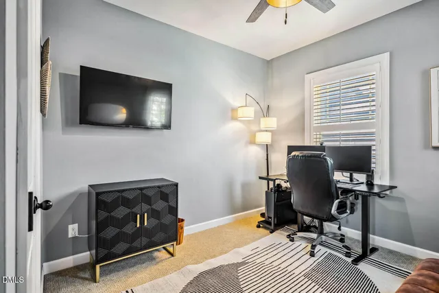 a view of a swimming pool with a yard