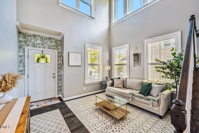 a kitchen with stainless steel appliances granite countertop a stove a sink dishwasher and a refrigerator