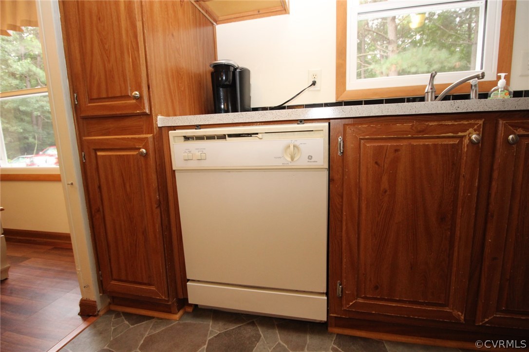 4278 Dorrell Road Aylett, VA 23009 - Photo 11 of 34 a view of a kitchen with fridge and wooden floor