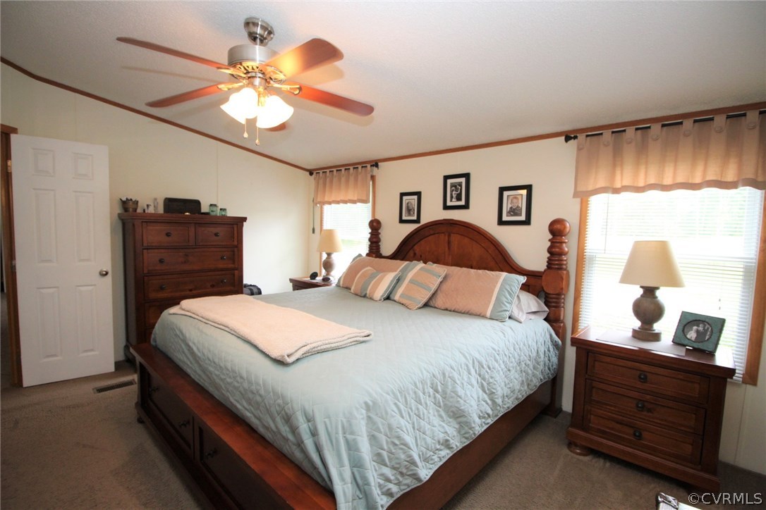 4278 Dorrell Road Aylett, VA 23009 - Photo 15 of 34 a bedroom with a bed and wooden floor