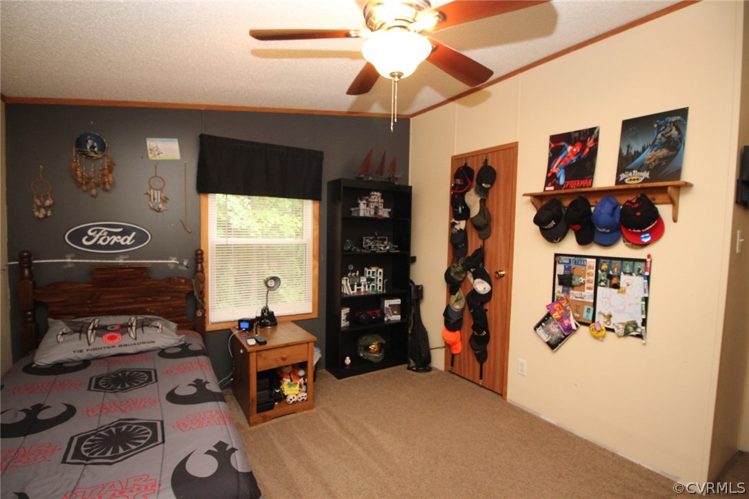 4278 Dorrell Road Aylett, VA 23009 - Photo 17 of 34 a bedroom with a bed and a window