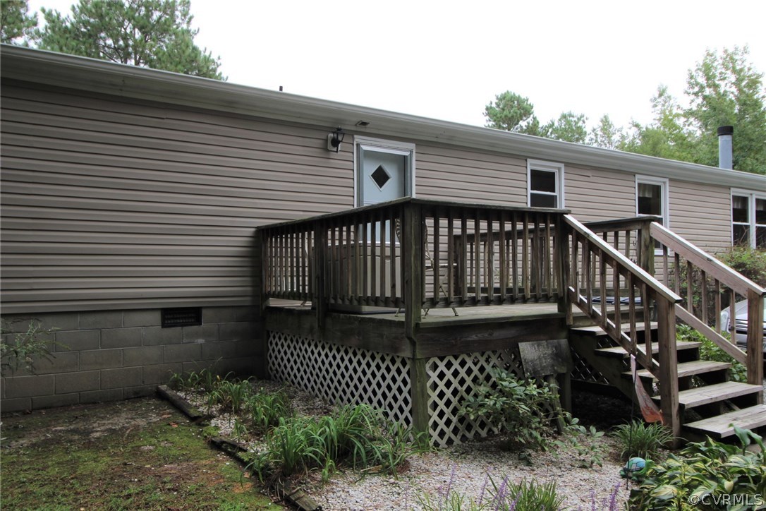 4278 Dorrell Road Aylett, VA 23009 - Photo 24 of 34 a view of a house with wooden deck