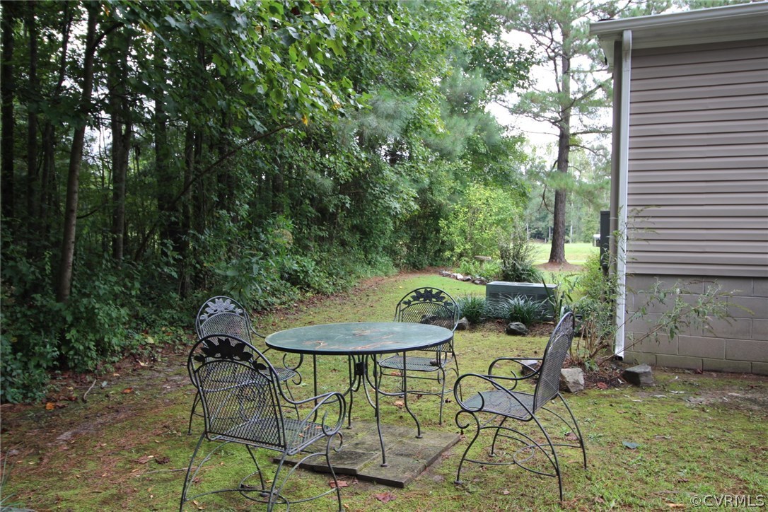4278 Dorrell Road Aylett, VA 23009 - Photo 26 of 34 a view of a chairs and table in patio