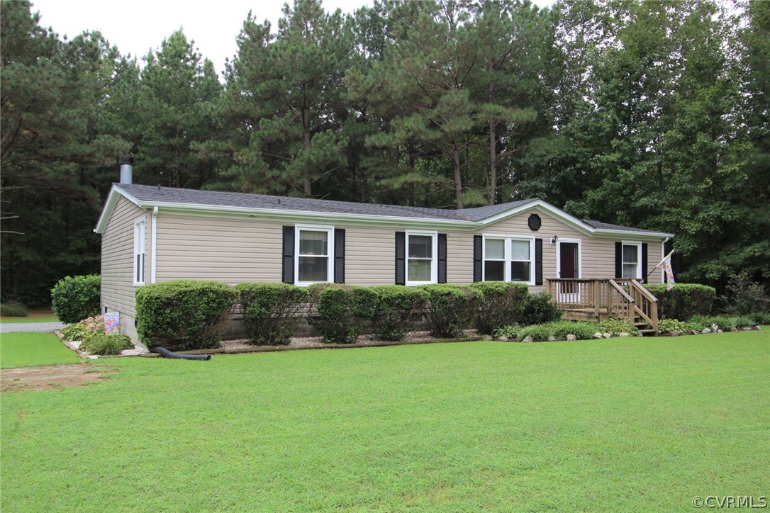 4278 Dorrell Road Aylett, VA 23009 - Photo 31 of 34 a front view of a house with a yard and garage