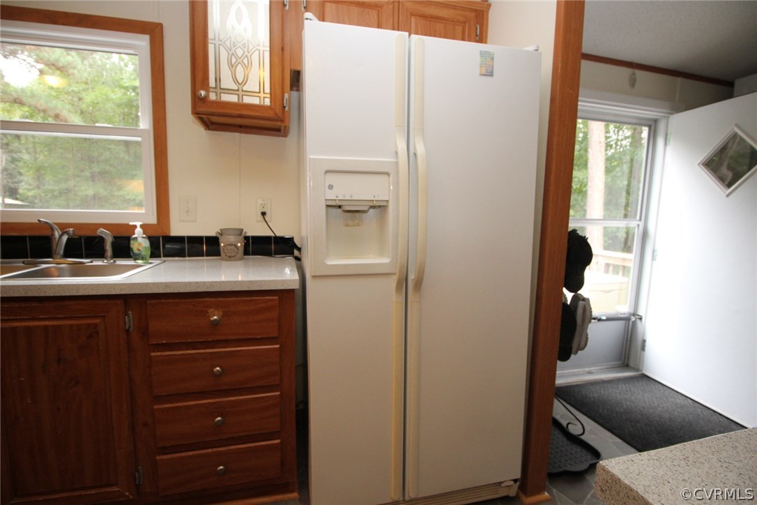 4278 Dorrell Road Aylett, VA 23009 - Photo 10 of 34 a kitchen with a refrigerator and a sink