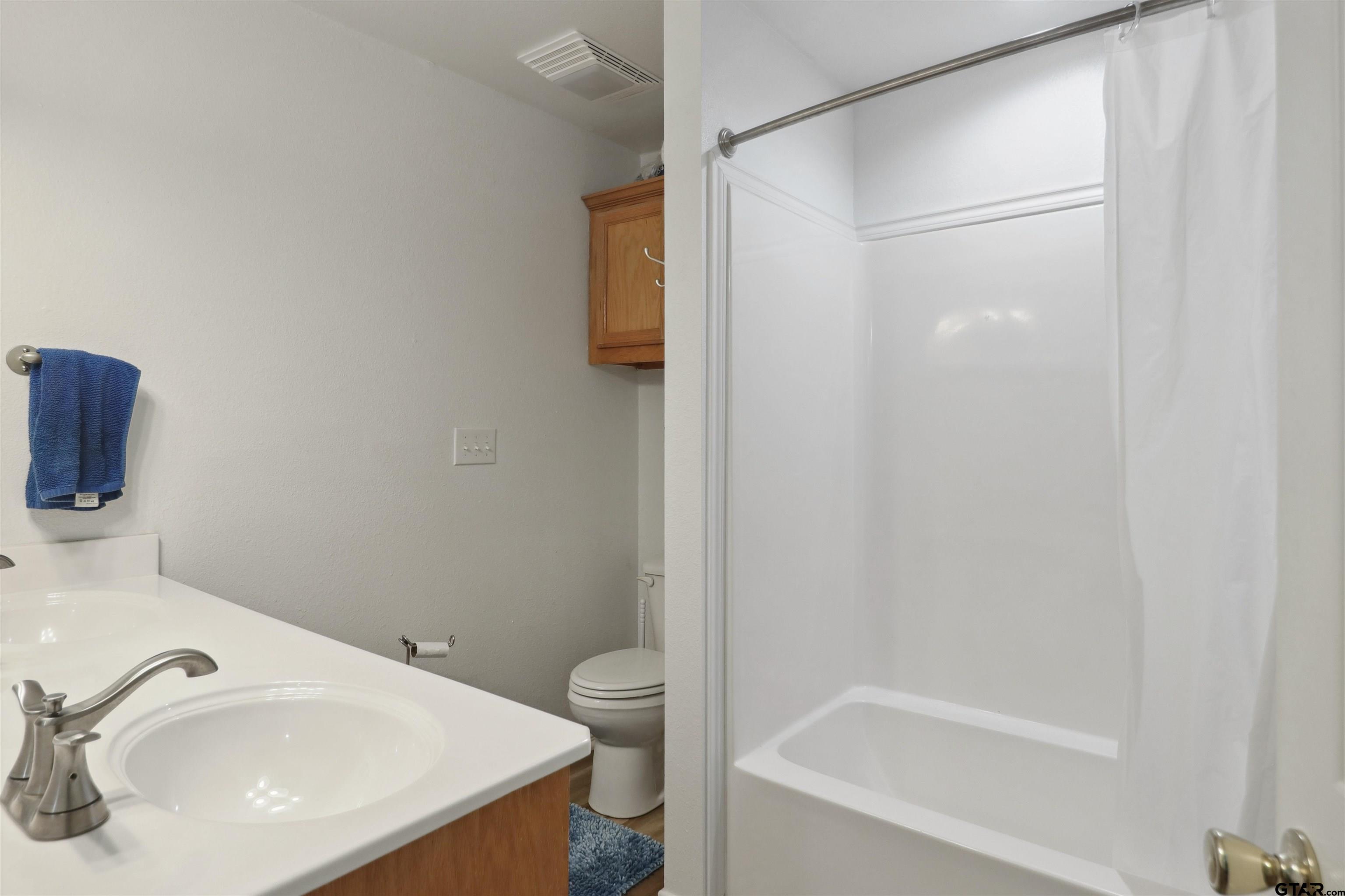 830 County Road 2201 Rusk, TX 75785 - Photo 25 of 40 a bathroom with a sink and a mirror