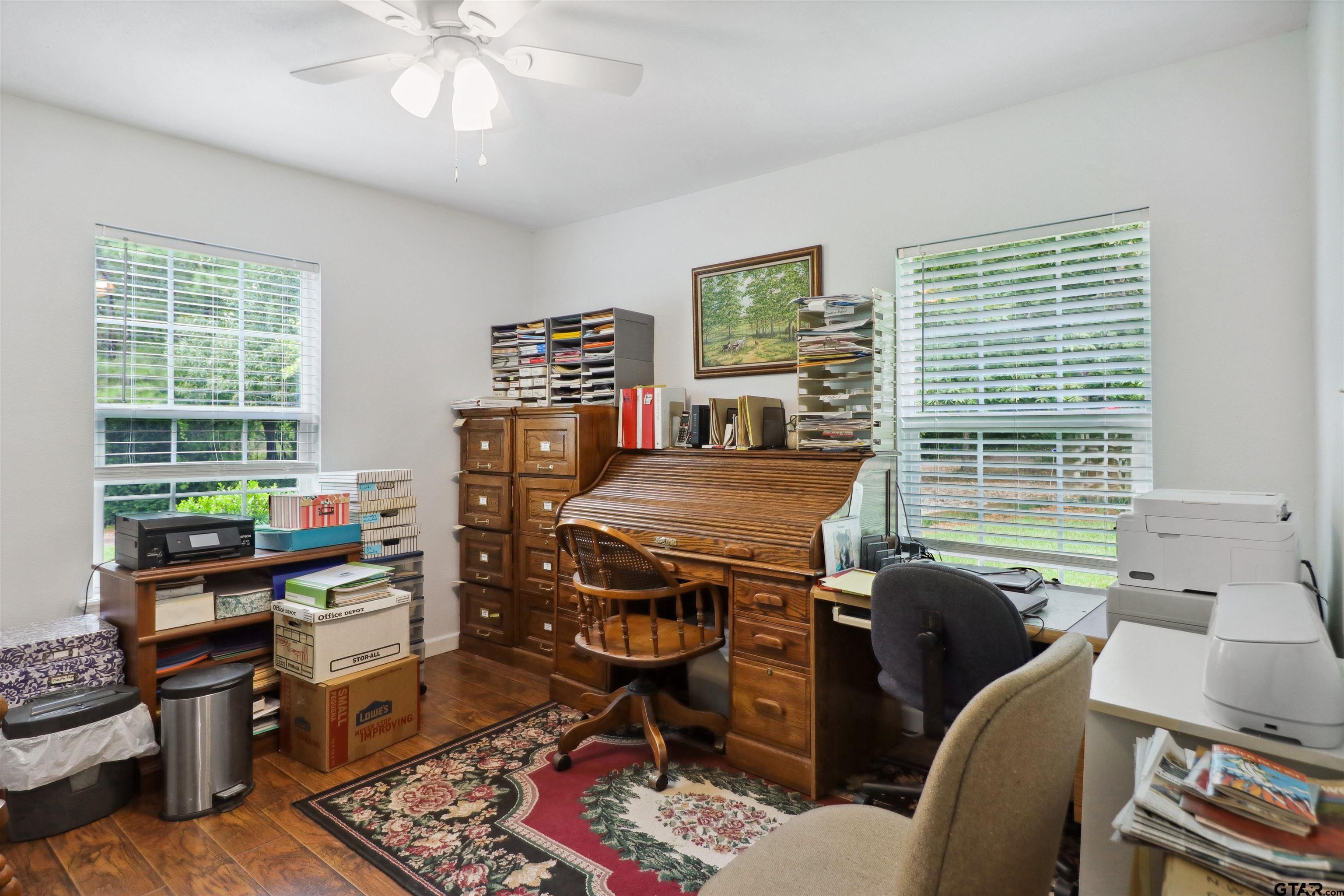 830 County Road 2201 Rusk, TX 75785 - Photo 27 of 40 a view of a workspace with furniture and a window