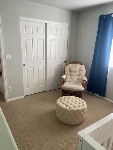 a view of a livingroom with furniture