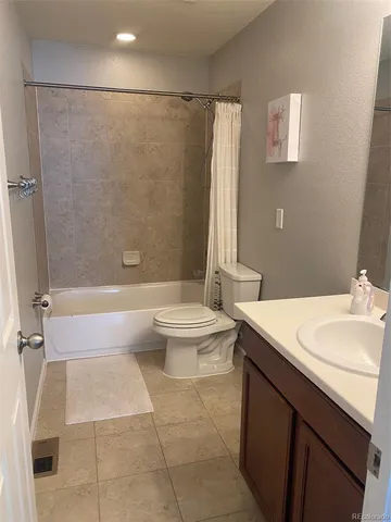 a bathroom with a sink a toilet and a bathtub