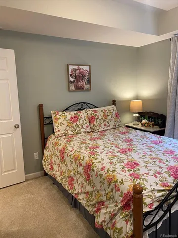a bathroom with a toilet a sink and shower