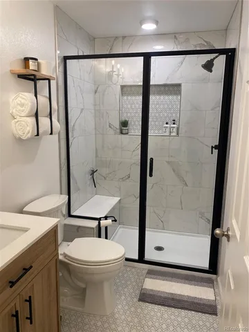 a bathroom with a sink and a toilet