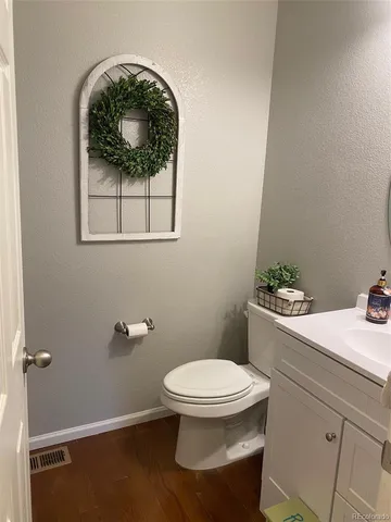 a bathroom with a toilet and a sink