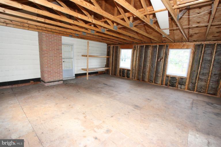 15101 Middlegate Road Silver Spring, MD 20905 - Photo 11 of 28 Unfinished attic off master bedroom