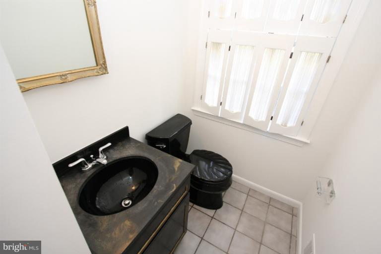 15101 Middlegate Road Silver Spring, MD 20905 - Photo 16 of 28 Half bath on first floor