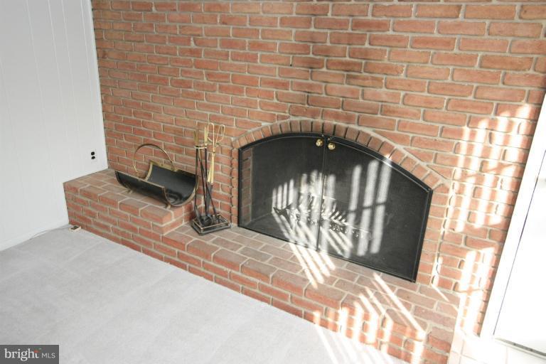 15101 Middlegate Road Silver Spring, MD 20905 - Photo 18 of 28 Large wood burning fireplace