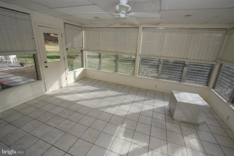 15101 Middlegate Road Silver Spring, MD 20905 - Photo 25 of 28 Glassed in Sun Porch