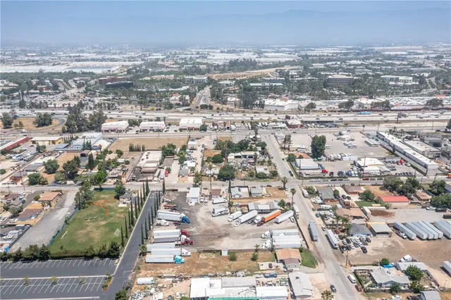 an aerial view of residential building and parking space