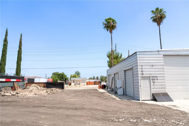 a view of a city street with cars