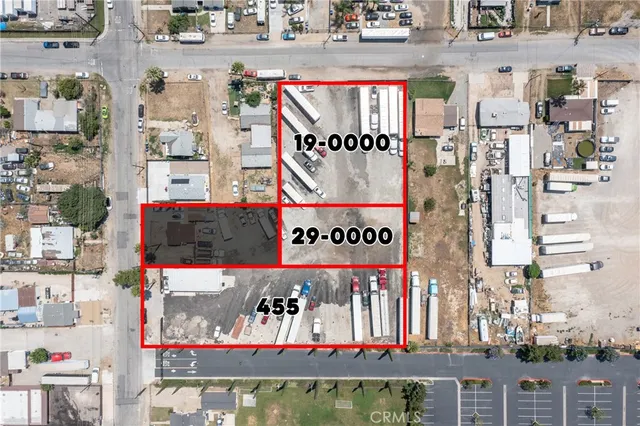 an aerial view of residential houses and city view