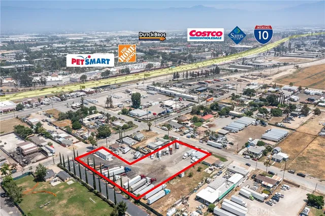 an aerial view of residential building and parking space