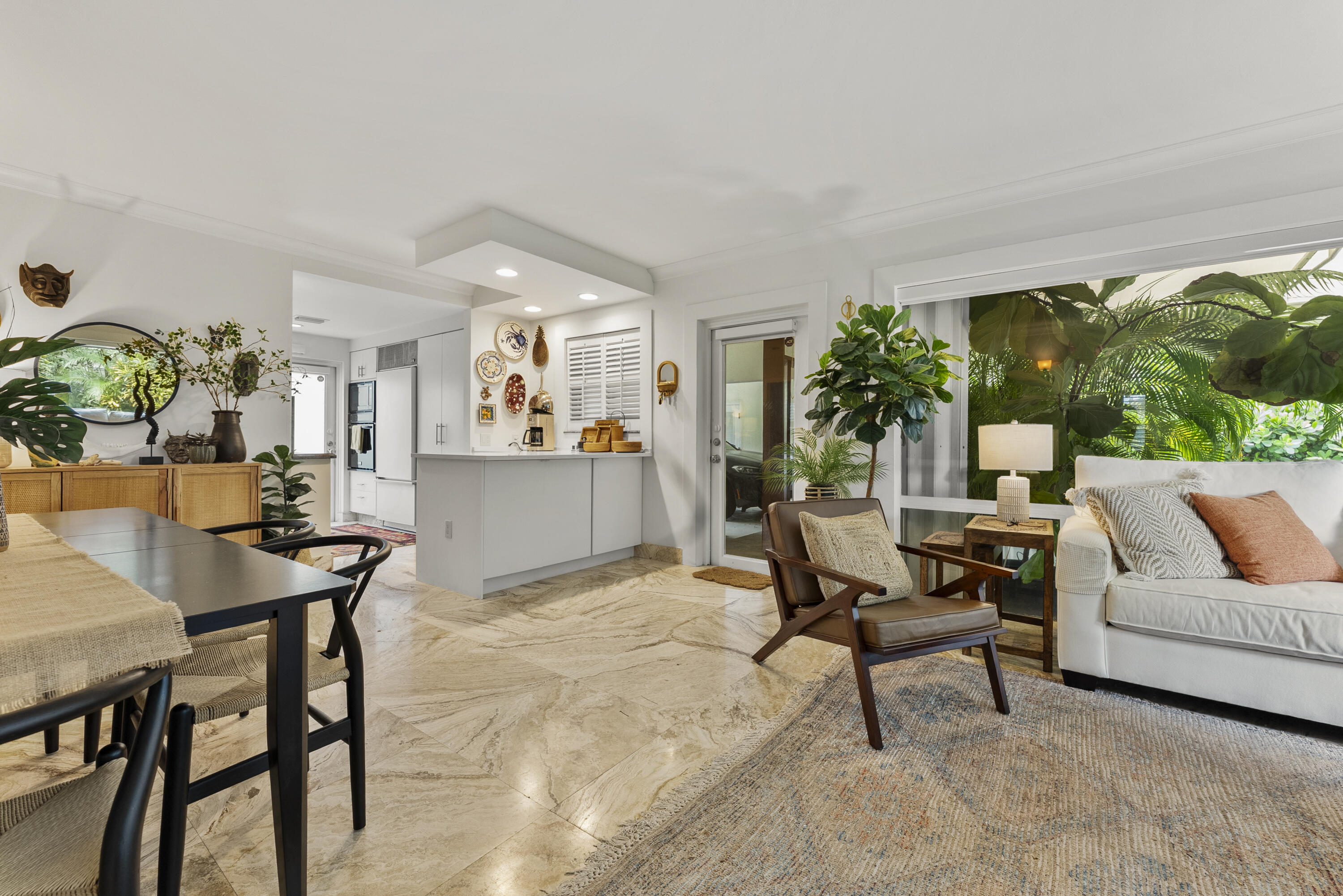 1202 Hillsboro Mile, Unit 2A Hillsboro Beach, FL 33062 - Photo 12 of 54 a living room with furniture and a large window