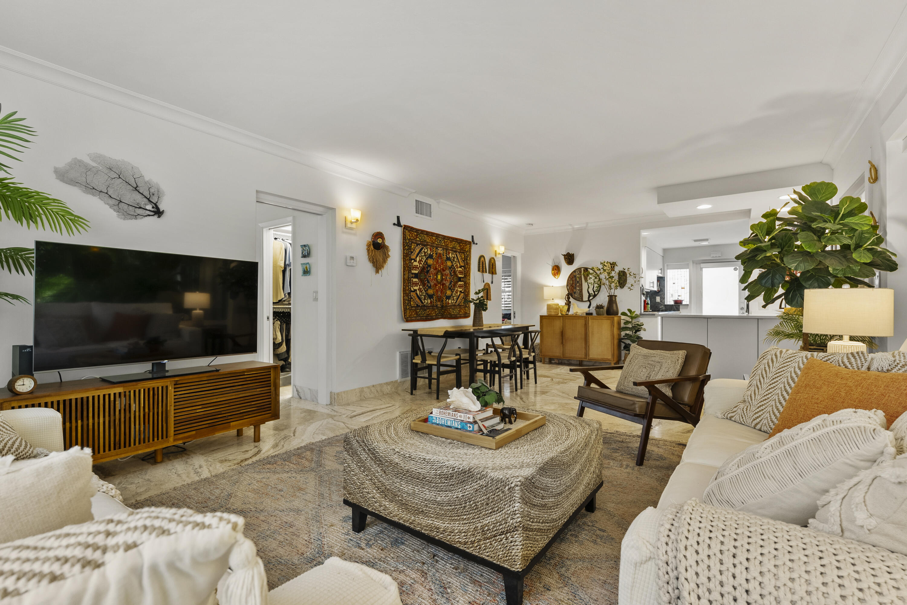 1202 Hillsboro Mile, Unit 2A Hillsboro Beach, FL 33062 - Photo 14 of 54 a living room with furniture and a flat screen tv