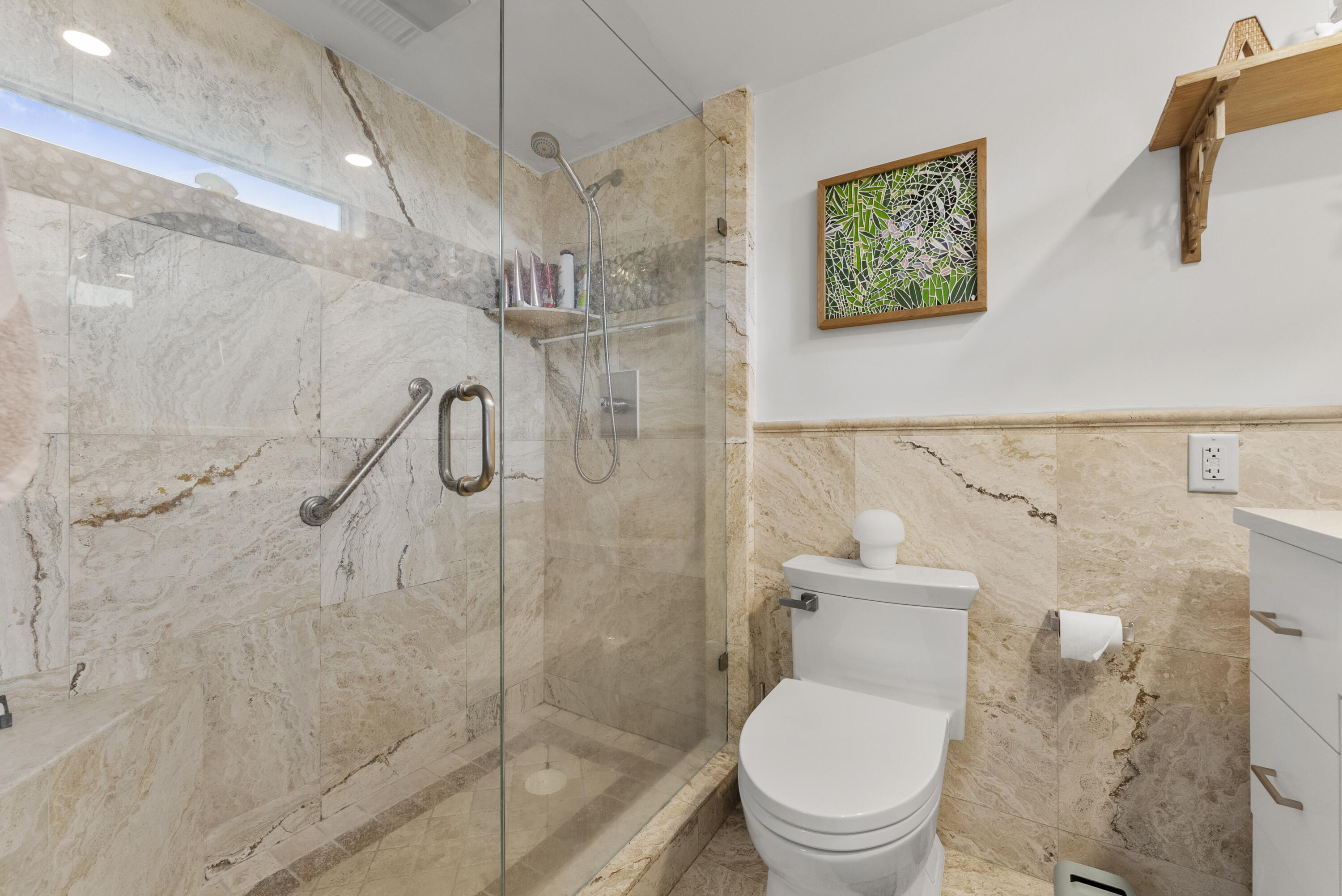 1202 Hillsboro Mile, Unit 2A Hillsboro Beach, FL 33062 - Photo 24 of 54 a bathroom with a toilet and a shower