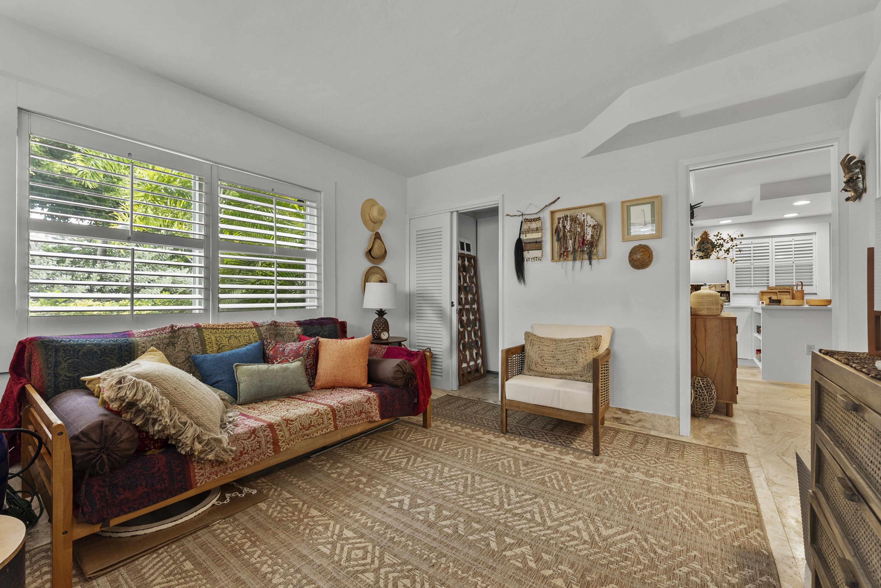 1202 Hillsboro Mile, Unit 2A Hillsboro Beach, FL 33062 - Photo 25 of 54 a living room with furniture and a large window