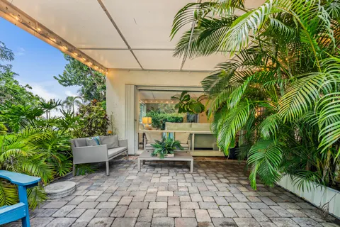 a view of swimming pool with seating area