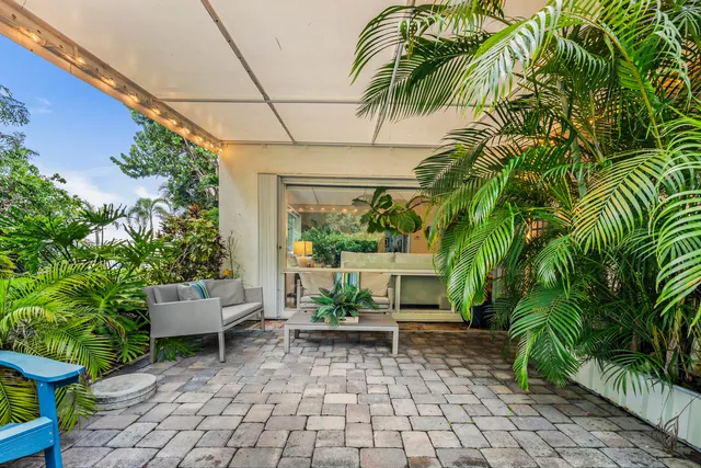a view of swimming pool with seating area