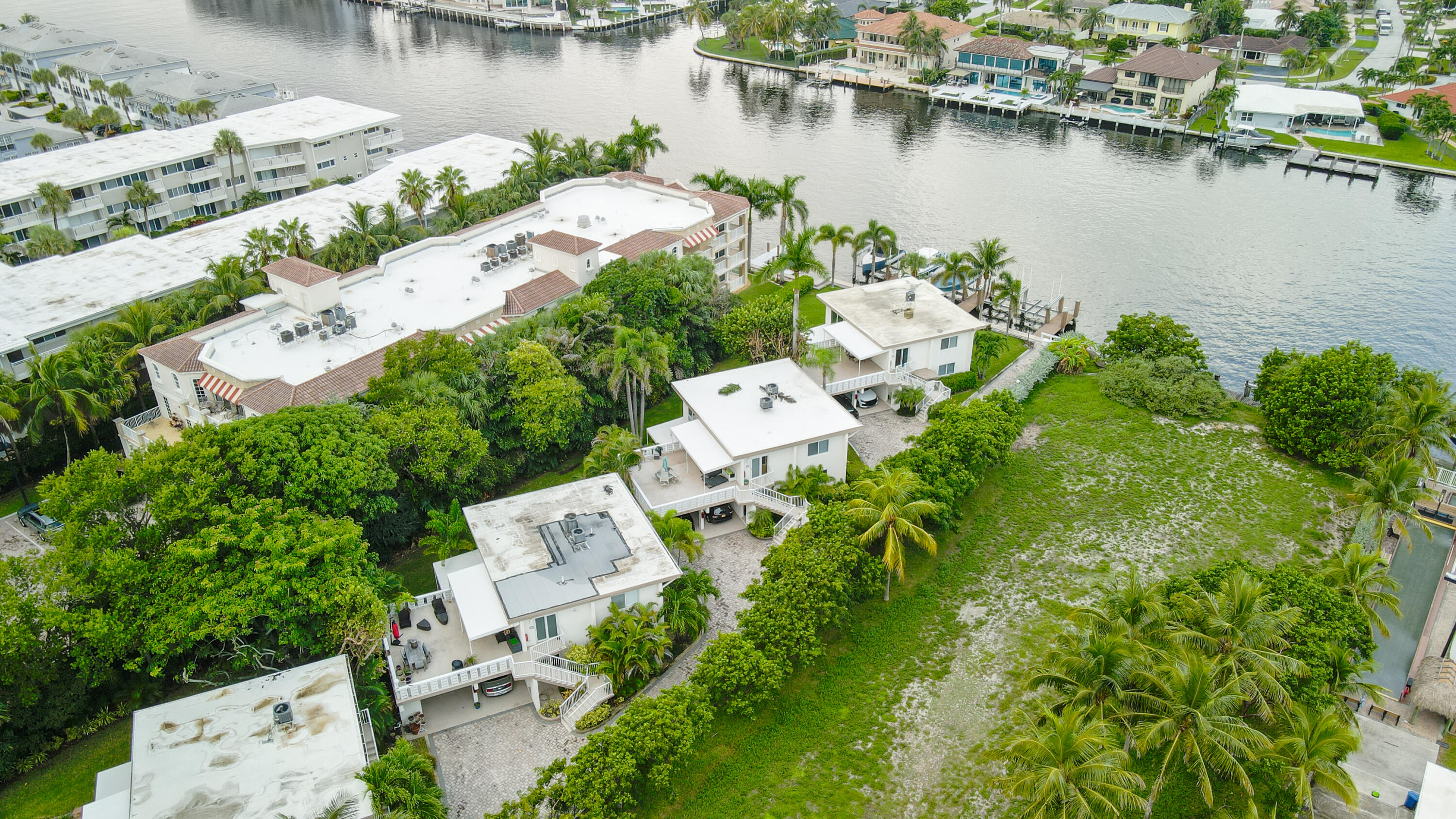 1202 Hillsboro Mile, Unit 2A Hillsboro Beach, FL 33062 - Photo 31 of 54 an aerial view of a house with a lake view