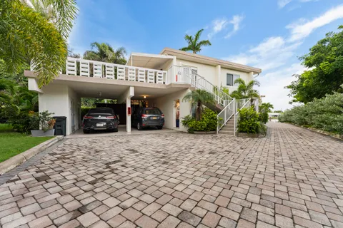 an aerial view of a city with lake view