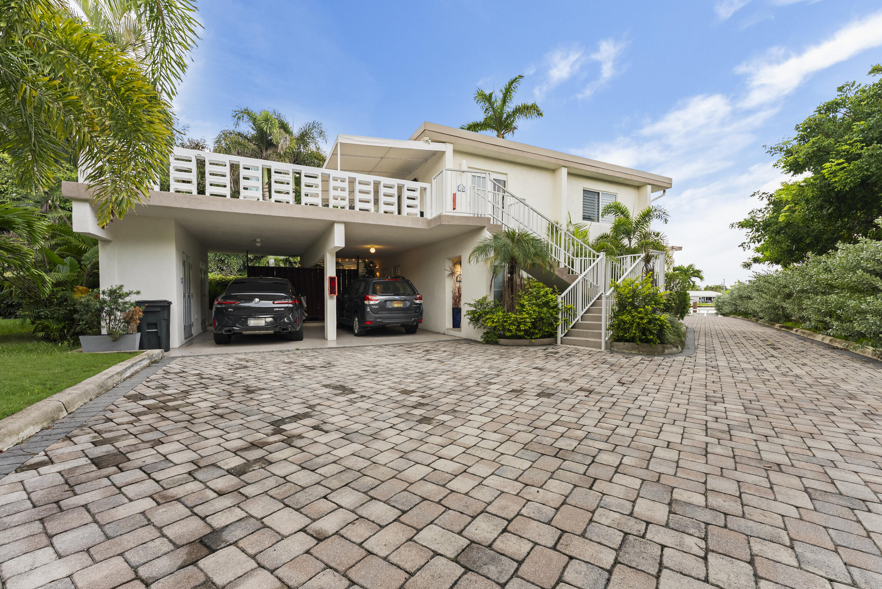1202 Hillsboro Mile, Unit 2A Hillsboro Beach, FL 33062 - Photo 34 of 54 a view of a house with a backyard