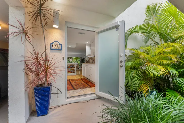 a aerial view of a house with a lake view