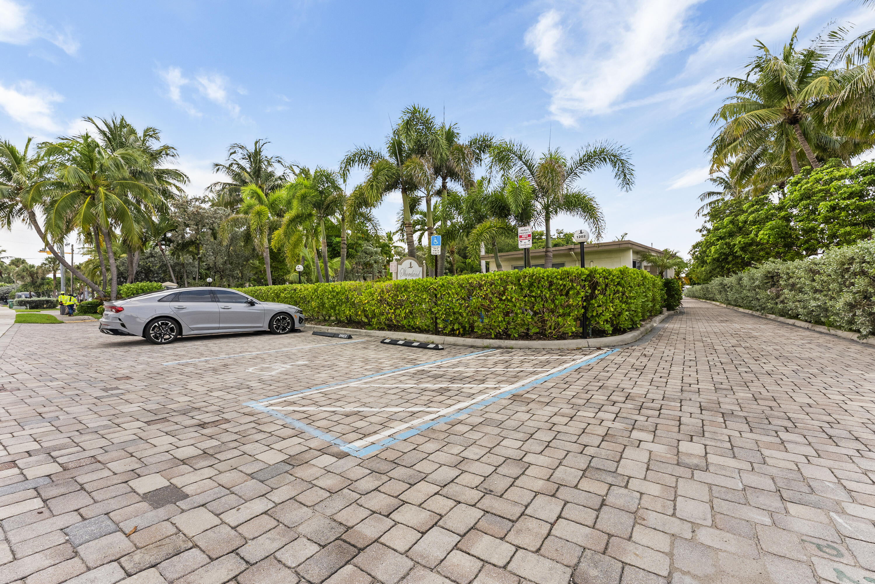 1202 Hillsboro Mile, Unit 2A Hillsboro Beach, FL 33062 - Photo 39 of 54 a car parked on the side of a road
