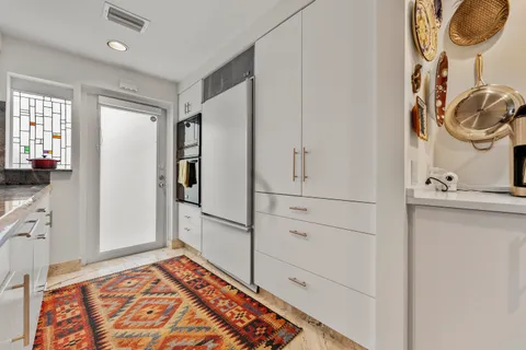 a view of a dinning table and chair in a room