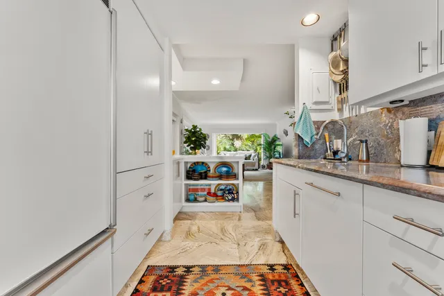 a workspace with furniture and window