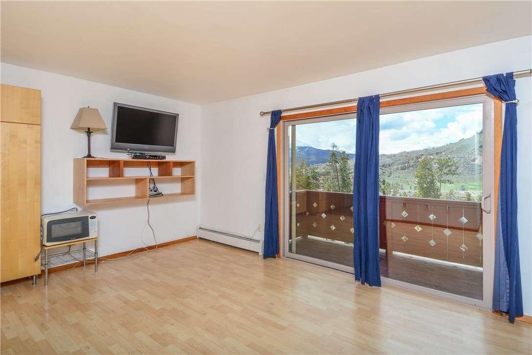 70 Evergreen Road, Unit 202 Dillon, CO 80435 - Photo 15 of 15 The open floor plan exists to the deck with wonderful views.