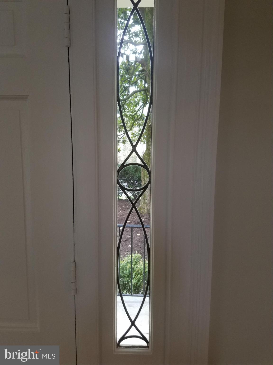 2834 Foxhall Road Northwest Washington, DC 20007 - Photo 6 of 10 Foyer detail of window by front door