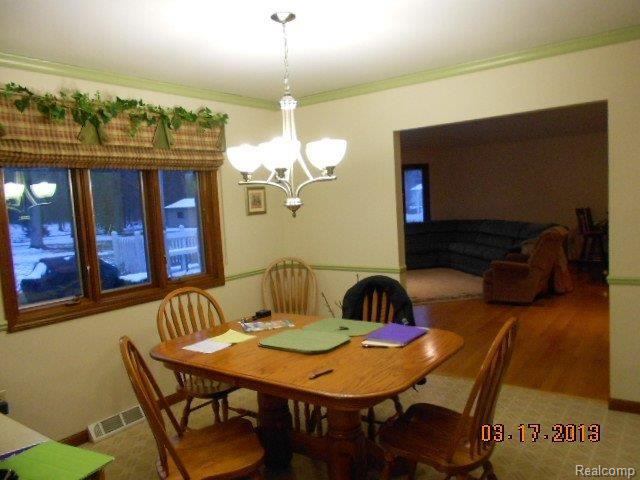 12946 Maxwell Road Carleton, MI 48117 - Photo 8 of 19 DSCN1170 Big Table Area.jpg