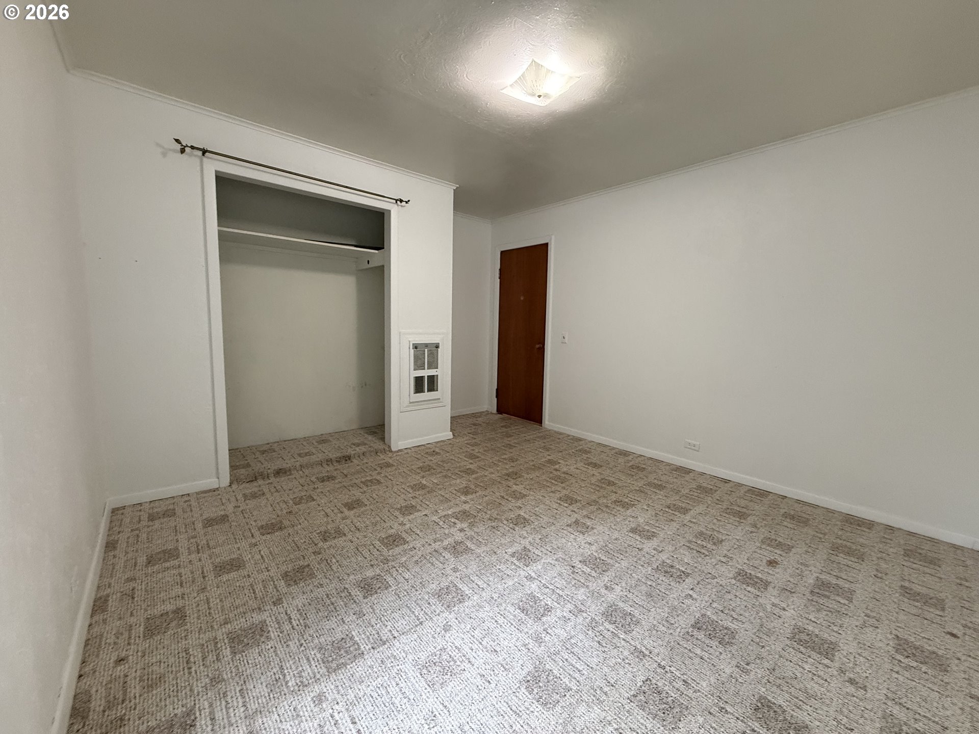 42710 Silver Springs Road Port Orford, OR 97465 - Photo 11 of 21 an empty room with a natural light