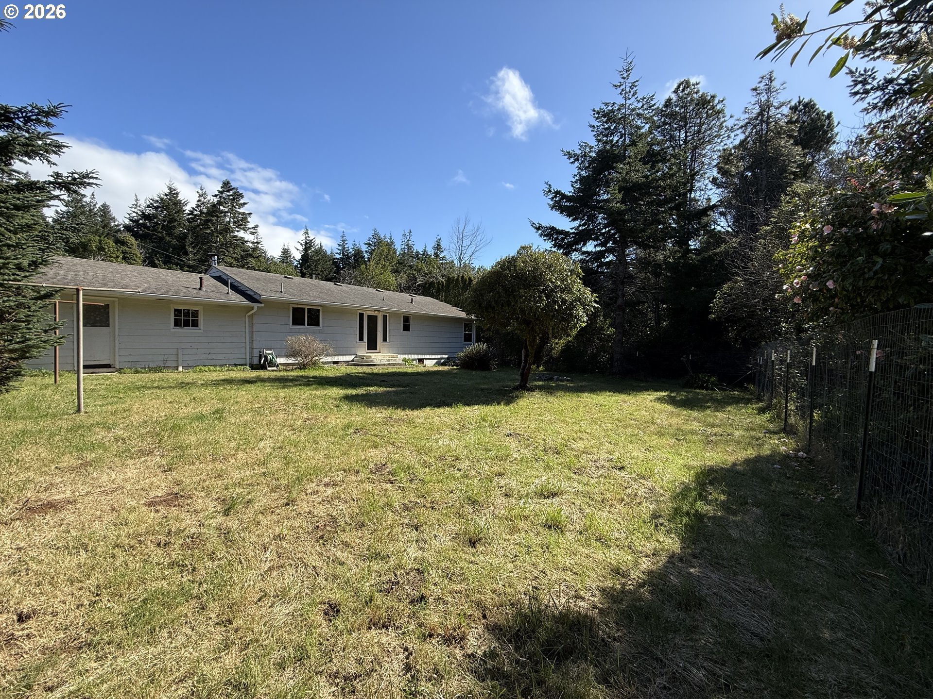 42710 Silver Springs Road Port Orford, OR 97465 - Photo 18 of 21 a view of a house with a yard