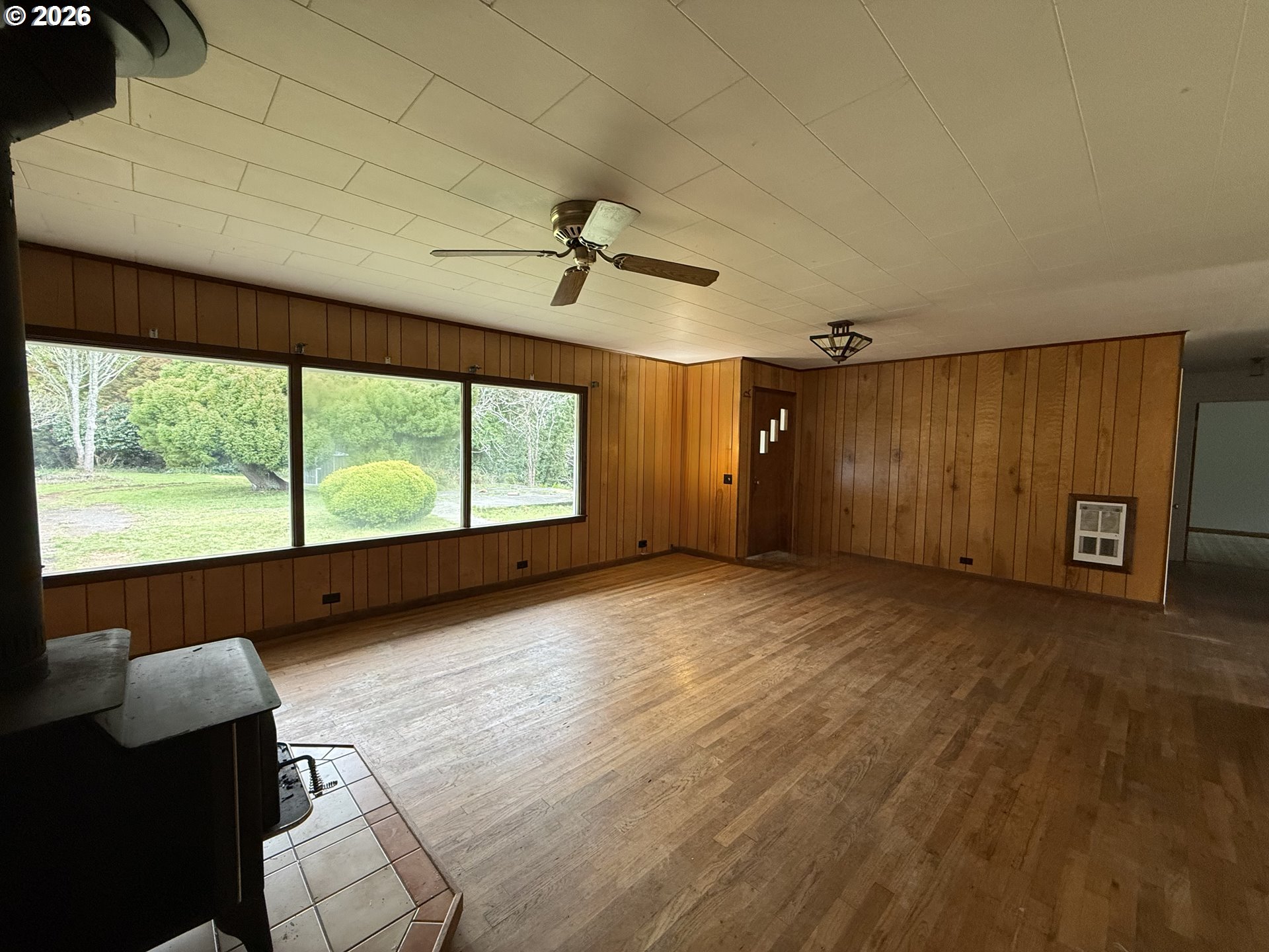 42710 Silver Springs Road Port Orford, OR 97465 - Photo 2 of 21 a view of an empty room with a window