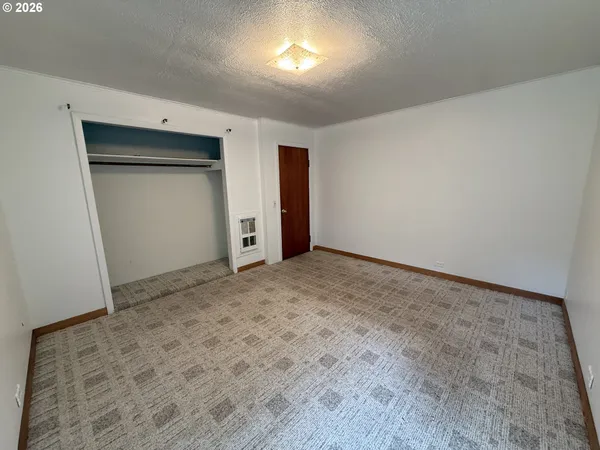 an empty room with a natural light