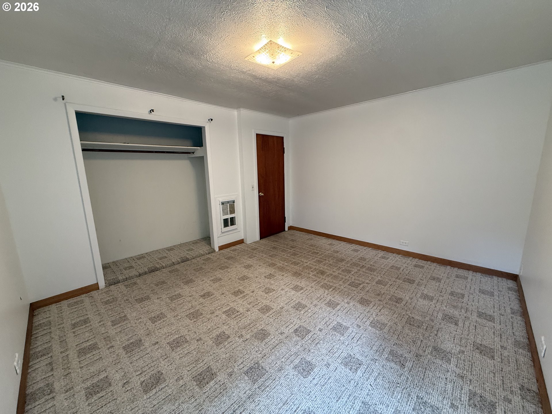 42710 Silver Springs Road Port Orford, OR 97465 - Photo 9 of 21 an empty room with a natural light