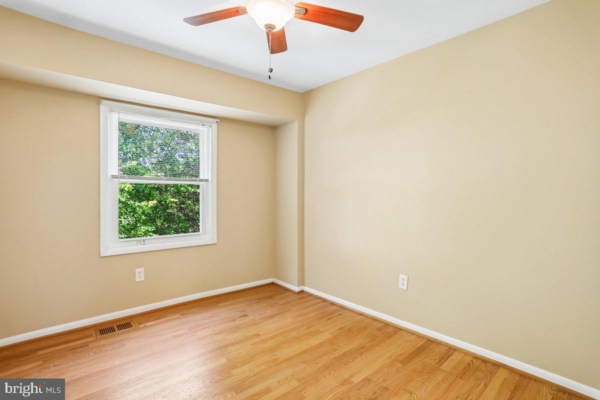 76 Timber Rock Road Gaithersburg, MD 20878 - Photo 32 of 51 an empty room with a window