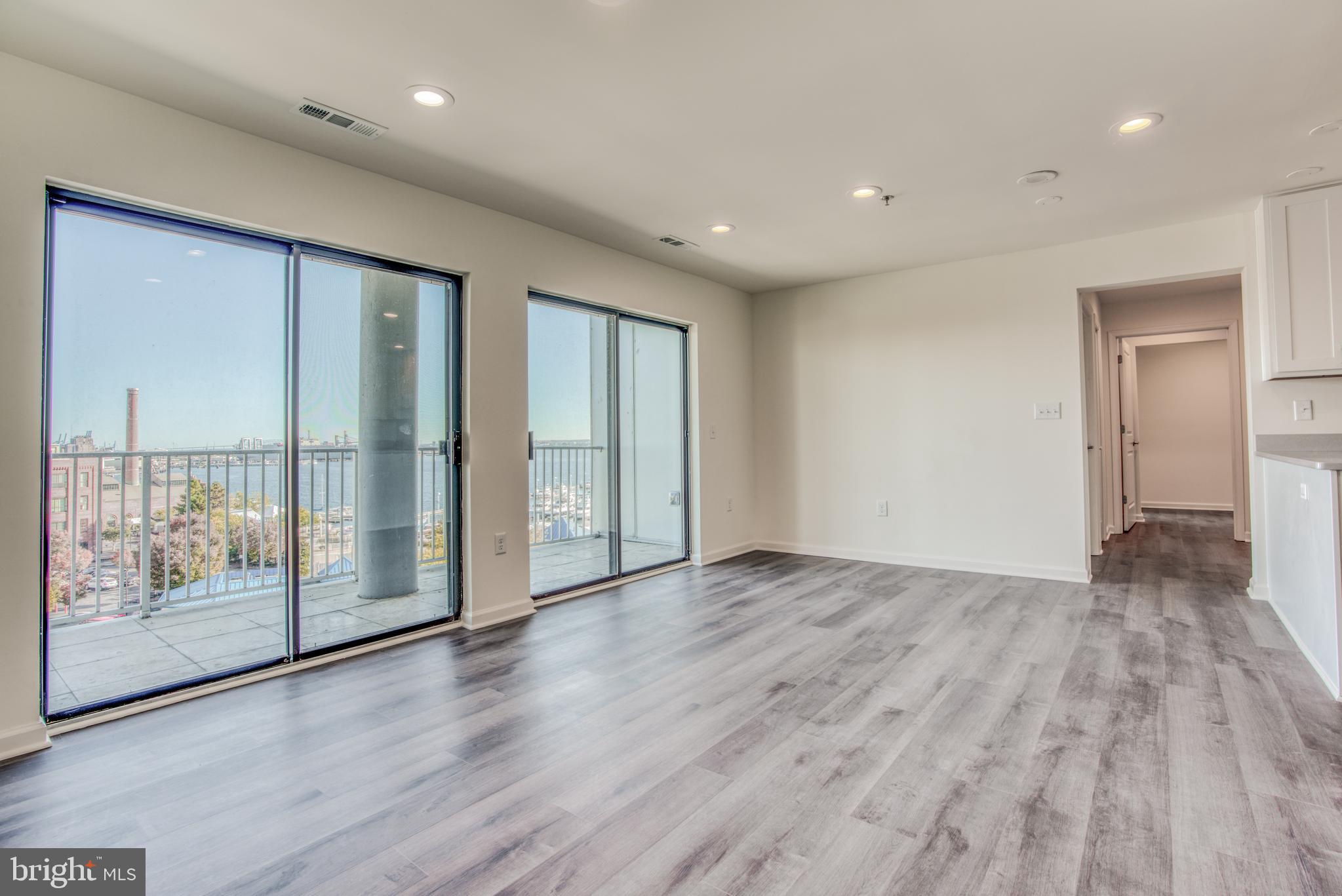 2702 Lighthouse Point East, Unit 626 Baltimore, MD 21224 - Photo 15 of 60 Hardwood floors throughout!